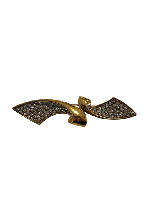 Golden rhinestone brooch