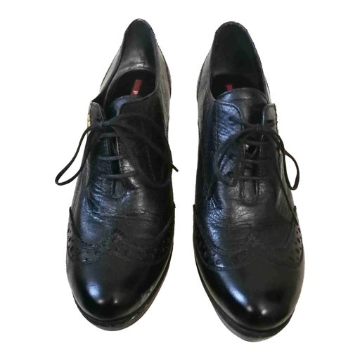 Prada derbies