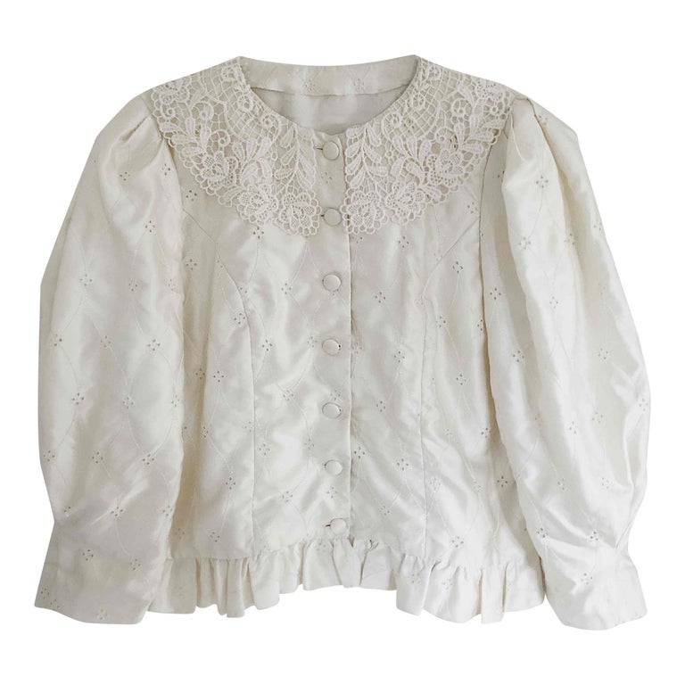 Blouse à motifs brodés