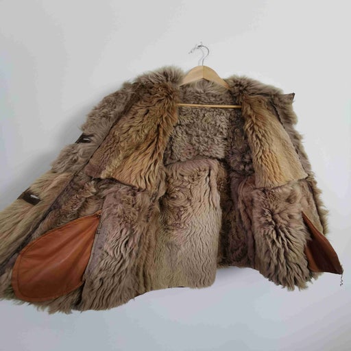 Manteau en peau lainée
