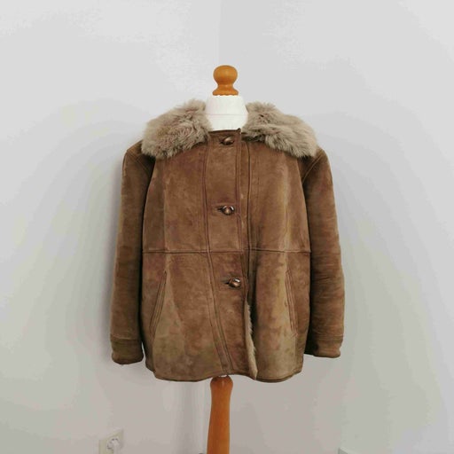 Manteau en peau lainée