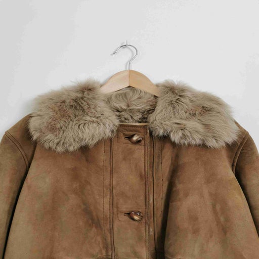 Manteau en peau lainée