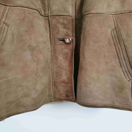 Manteau en peau lainée