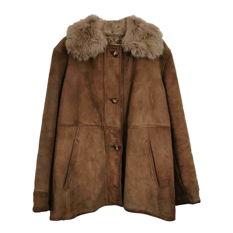 Manteau en peau lainée