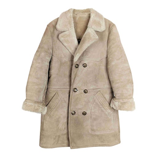 Manteau en peau lainée