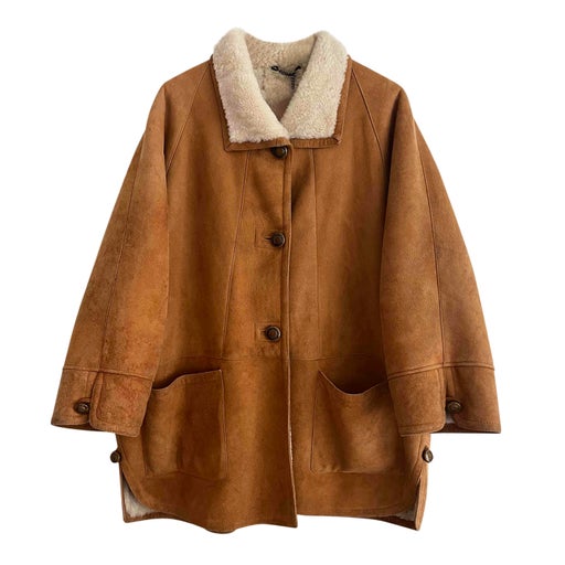 Manteau en peau lainée