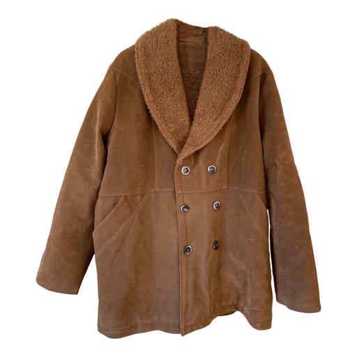 Manteau en peau lainée