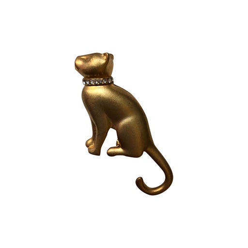 Golden metal brooch