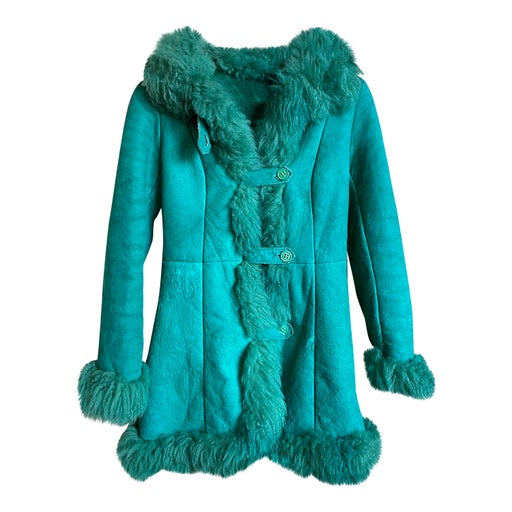 Manteau en peau lainée