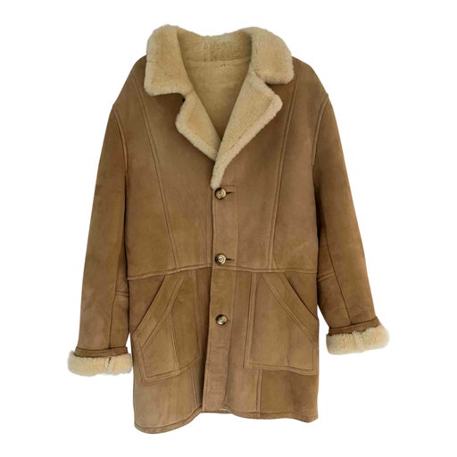 Manteau en peau lainée