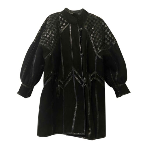 Manteau en peau lainée
