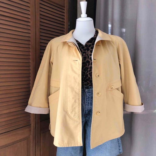Pastel yellow trench coat