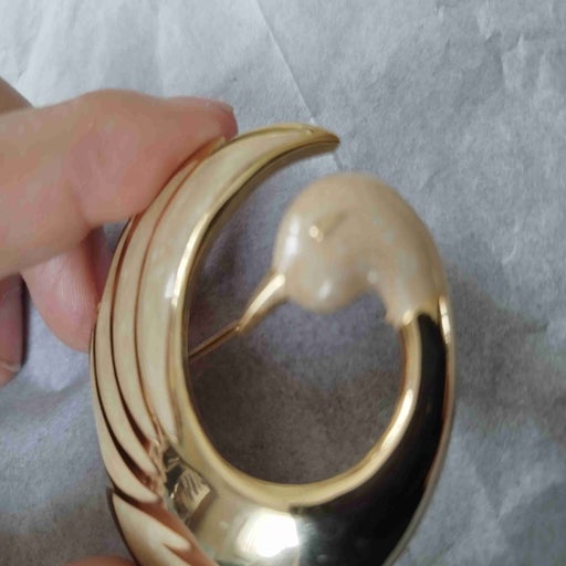 Gold and enamel brooch