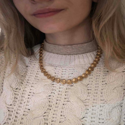 Golden metal necklace