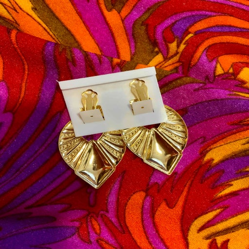 Golden metal earrings