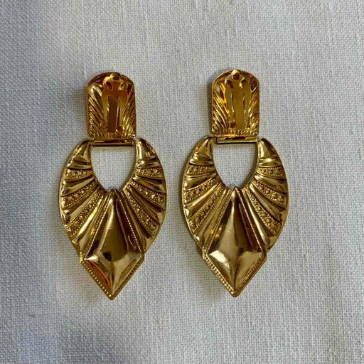 Golden metal earrings