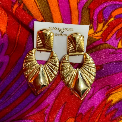 Golden metal earrings