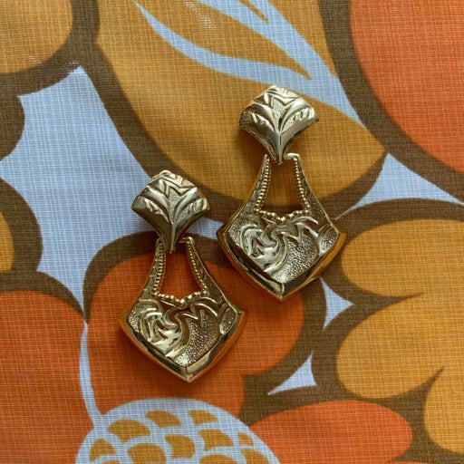Golden metal earrings