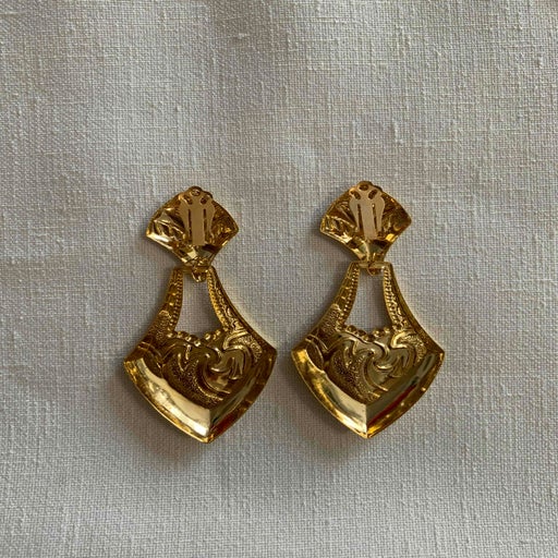 Golden metal earrings
