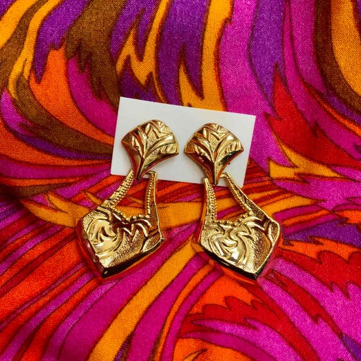 Golden metal earrings