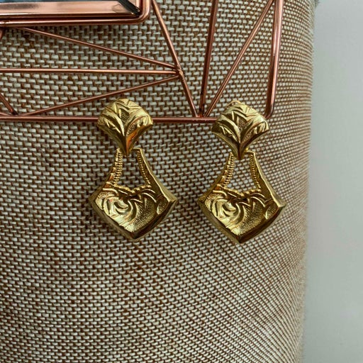 Golden metal earrings