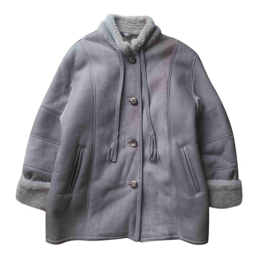 Manteau en peau lainée