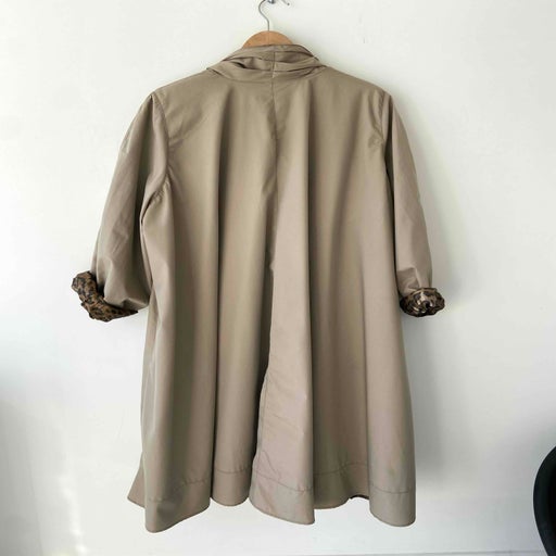 Collarless trench coat