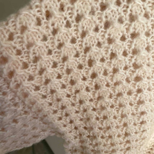 Openwork wool sweater