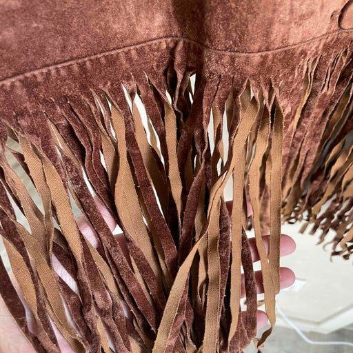 Fringed sleeveless cardigan
