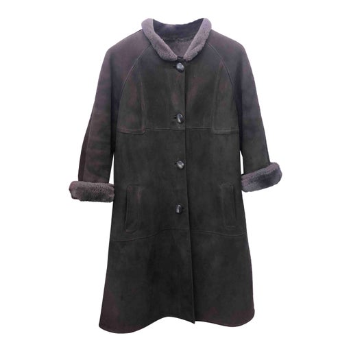Manteau en peau lainée
