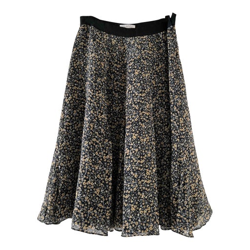 Floral silk skirt. Rotating fluid form