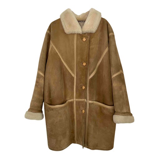 Manteau en peau lainée