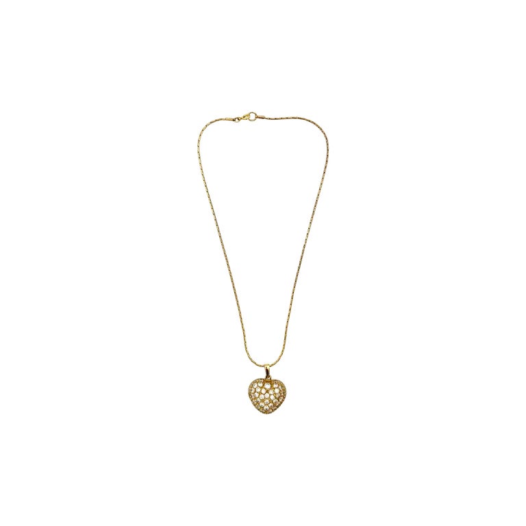 Collier pendentif en métal doré