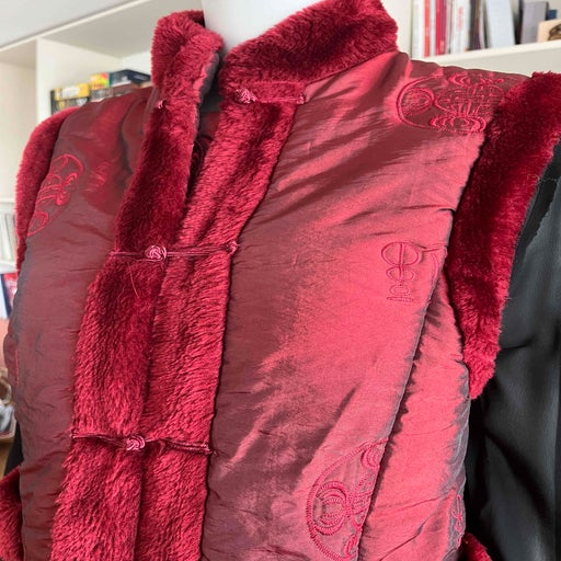 Satin sleeveless down jacket