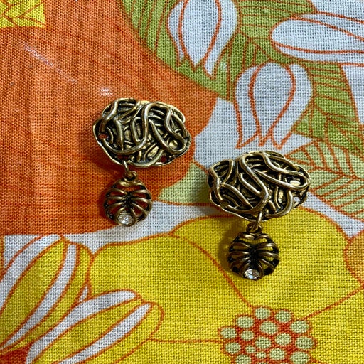 Golden metal earrings