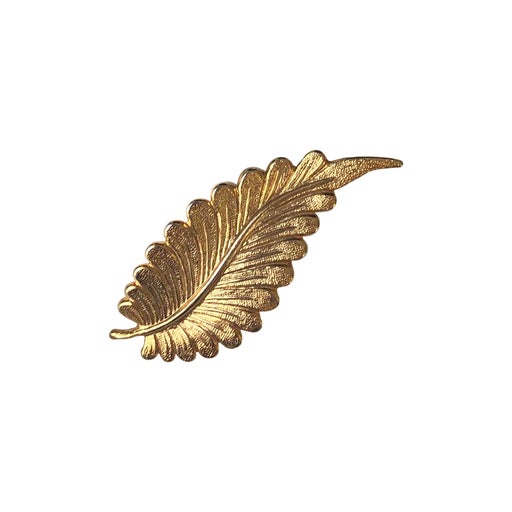 Golden metal brooch