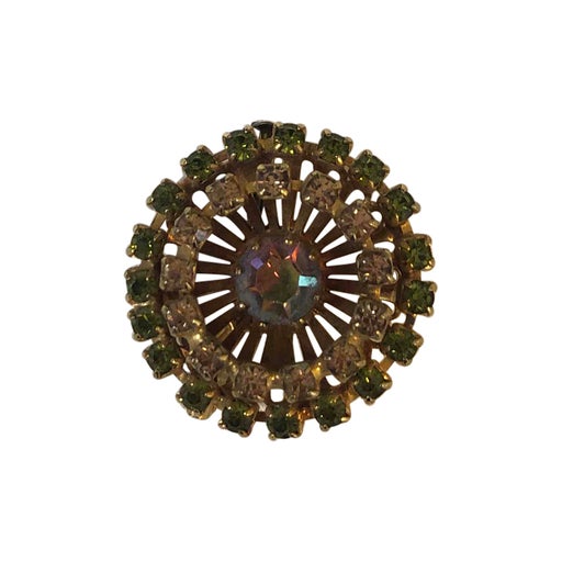 Golden metal brooch
