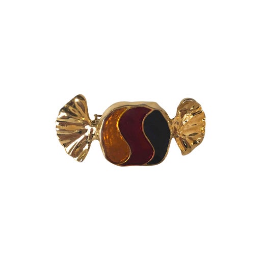 Golden metal brooch