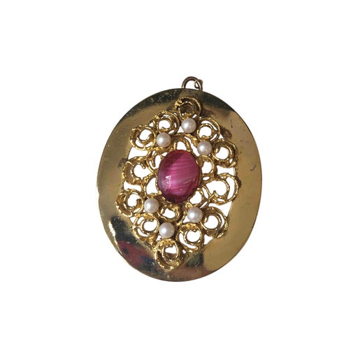 Pendentif en métal doré