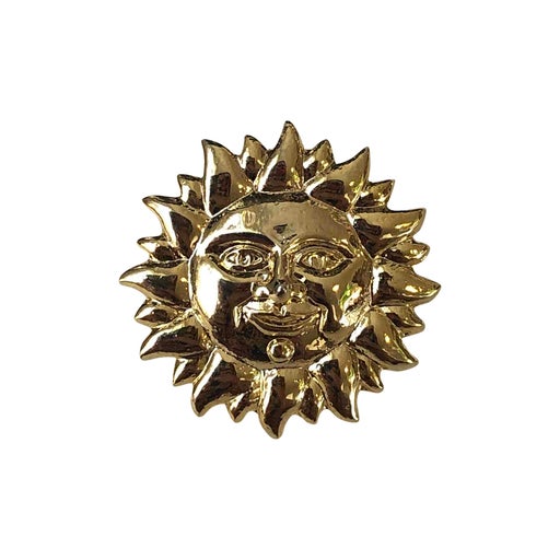 Golden metal brooch