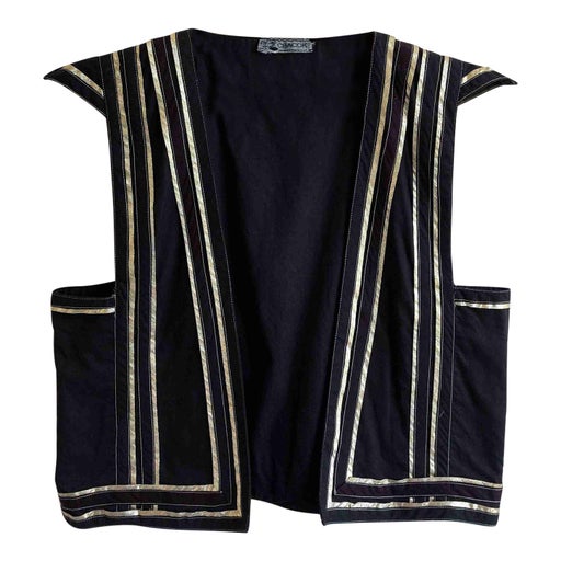 Black and gold vest