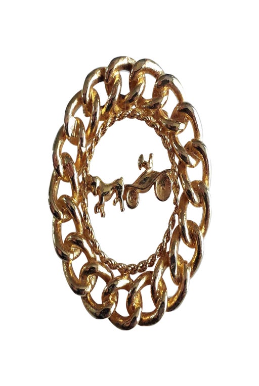 Carriage brooch