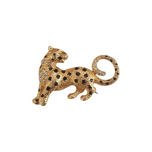 Golden metal brooch