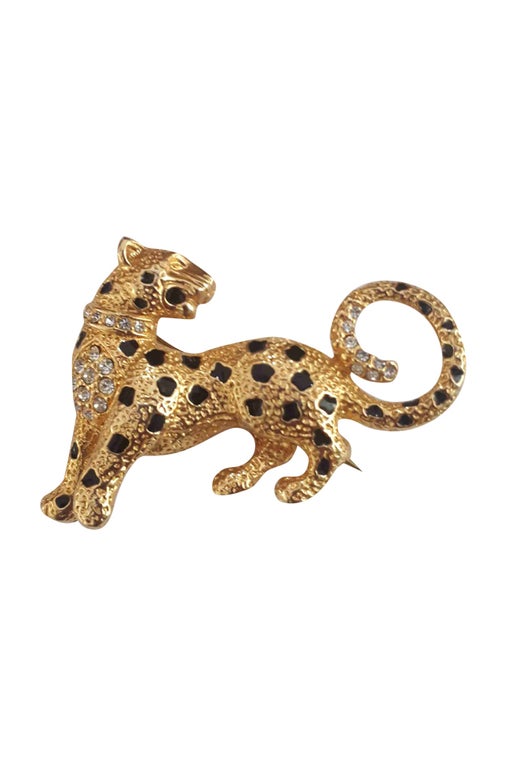 Golden metal brooch