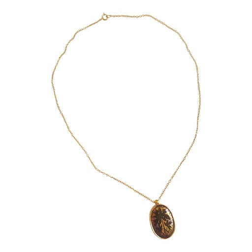 Collier pendentif en métal doré