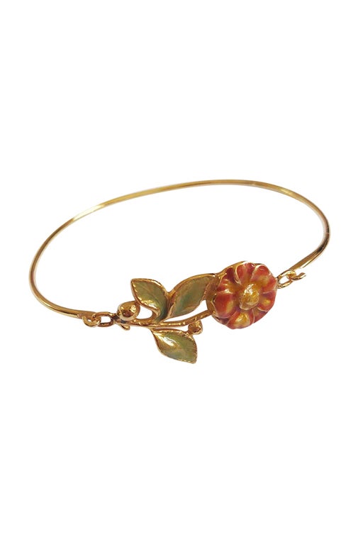 Bangle bracelet in gold metal