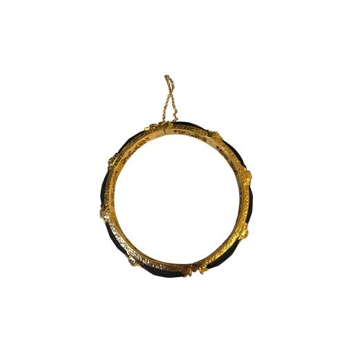 Gold and black metal bracelet