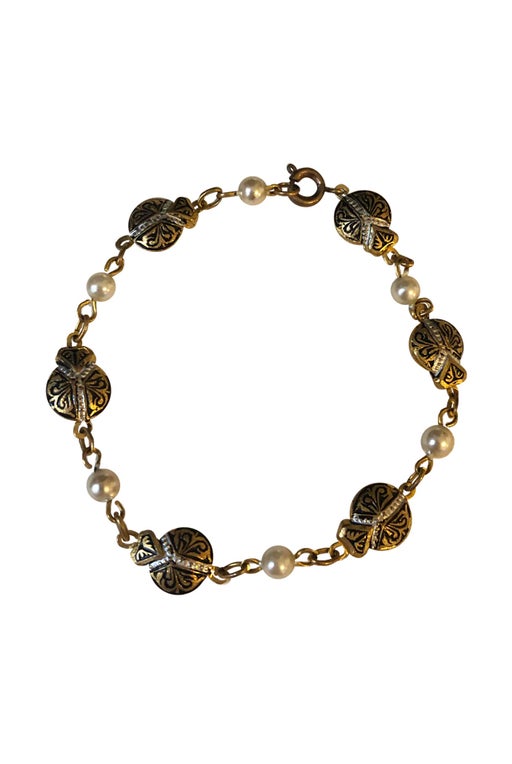 Bracelet in gold metal and pearls