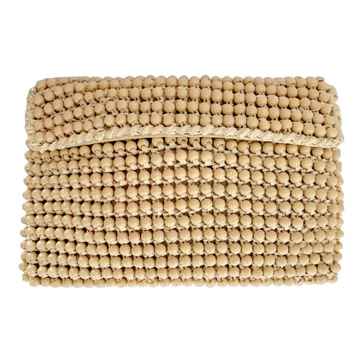 Straw and pearl clutch