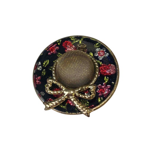 Golden metal brooch